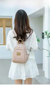 Mini sac à dos beige en tissu Oxford avec fermetures éclair doubles pour l'extérieur