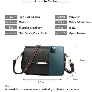 Litchi pattern black PU leather crossbody bag with brown strap and metal buckle