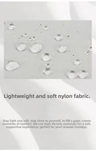 Detailed macro view of water-resistant nylon fabric with clear droplets on the surface