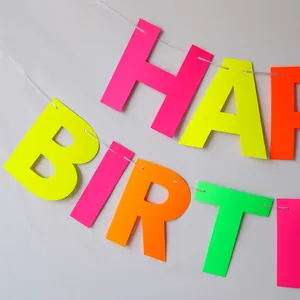 Neon Happy Birthday banner with colorful fluorescent paper letters for party decoration
