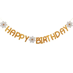 Detail of yellow Happy Birthday banner with white daisy flowers for party decorations