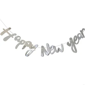 Silver metallic Happy New Year banner decoration hanging on a white background