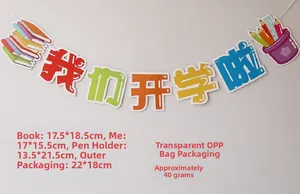Detail of school banner showing dimensions of colorful book and pen holder elements