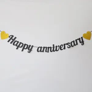 Happy Anniversary black bunting banner with gold glitter heart accents for party decor