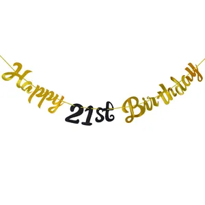 Close-up of elegant gold and black Happy 21st Birthday banner with decorative font
