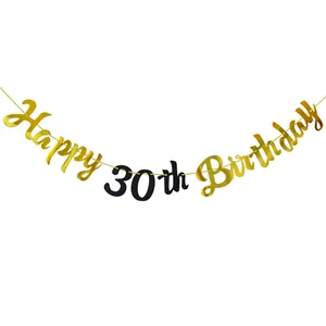 Detail of Happy 30th Birthday banner with gold lettering and black cardstock
