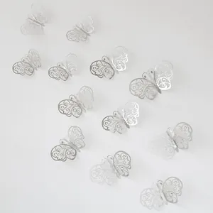 Set of 12 3D hollow silver butterfly wall stickers with metallic texture for home decor