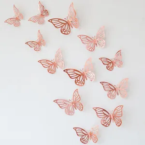 Set of 12 3D hollow butterfly wall stickers in rose gold finish for home decor