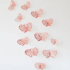 12-piece 3D rose gold hollow butterfly wall stickers with metallic texture for home decor