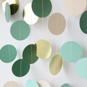 Sage green and gold paper circle garland for forest theme party wall decoration
