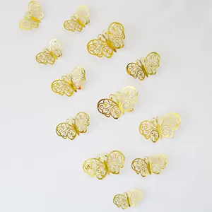 Set of 12 3D hollow gold butterfly wall stickers with metallic texture for home decor
