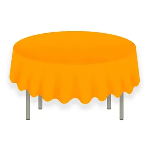 Close-up of bright orange round PEVA tablecloth with scalloped edges on a round table