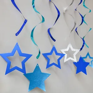 Close-up of blue and silver star ceiling decorations with metallic hanging swirls