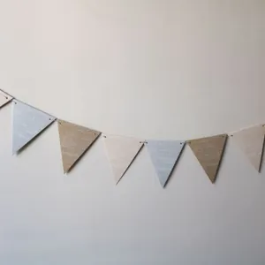 Detailed view of blue and khaki linen triangle flags with woven fabric textures