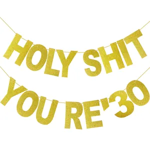Golden glitter 'Holy Shit You're 30' banner for 30th birthday party celebration