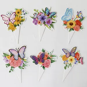 Dettaglio di 6 topper per torta a farfalla e fiori con motivi ad acquerello