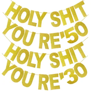 Golden glitter 'Holy Shit You're 30/50' letter banner for birthday party decorations