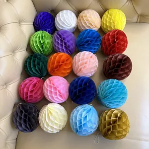 Detailed top view of 20 assorted honeycomb paper balls for festive party decorations