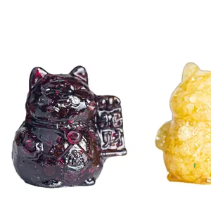 Lucky Maneki Neko cat statues in clear resin with purple and yellow natural crystals