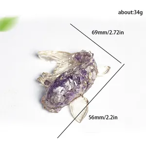 Amethyst crystal koi fish resin ornament with measurements 69x56mm on white background