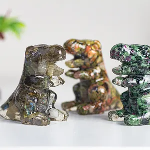 Three natural crystal monster figurines carved from labradorite, jasper and ruby zoisite