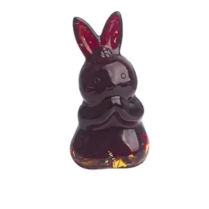 Deep red resin rabbit figurine with gold foil base for home desktop decoration