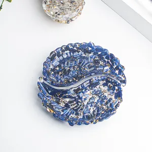 Yin Yang angel wing resin storage tray with blue crystals and gold leaf decor