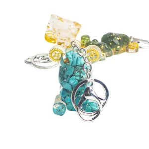 Handmade resin bear keychain with natural crystal gravel and internal metal gears
