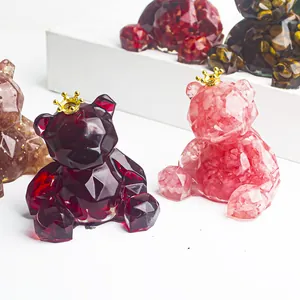 Geometric crystal bear figurines with gold crowns filled with colorful natural stones