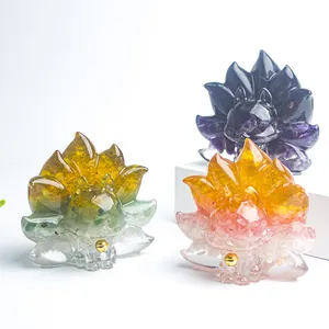 Three Nine-Tailed Fox statues with natural crystal gravel embedded in transparent resin