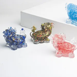 Handcrafted dragon turtle statues with natural crystal gravel inside clear resin base