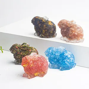 Set de 5 figuras de conejo en resina con cristales naturales y pan de oro