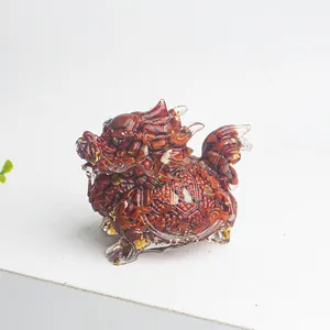 Crystal resin dragon turtle statue with reddish stones and gold leaf for home decor