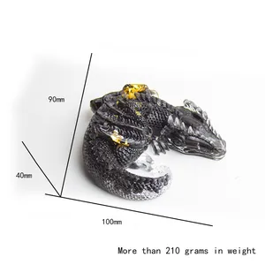 Sleeping dragon resin figurine with natural crystal stone and gold foil details 10x9cm