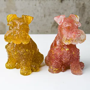 Detail of Schnauzer dog figurines with resin crystal texture and embedded gold foil