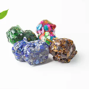 Close-up of animal figurines made of natural crushed crystals and transparent resin