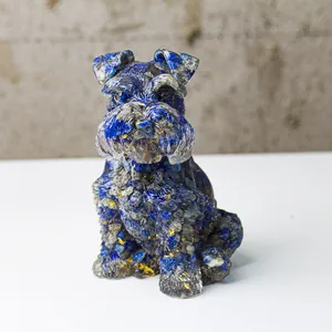 Detailed close-up of a Schnauzer dog statue with a blue and gold mosaic stone texture