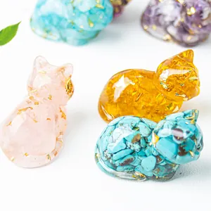 Cute resin cat ornaments filled with natural healing crystals and decorative gold foil
