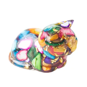 Lying cat figurine made of crystal resin and gold foil for home and office desktop decor