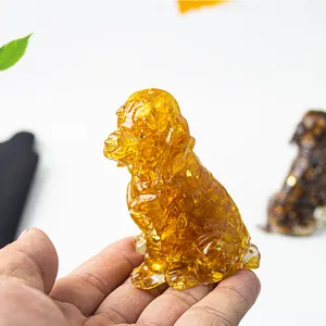 Golden retriever puppy figurine made of amber crystal resin with gold foil flakes inside