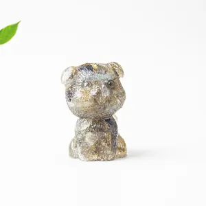 Macro detail of a resin cat figurine with natural crystal gravel and matte texture finish