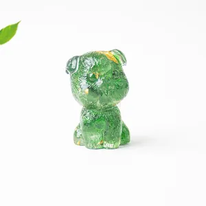 Macro shot of a green translucent resin schnauzer figurine with elegant gold foil flakes