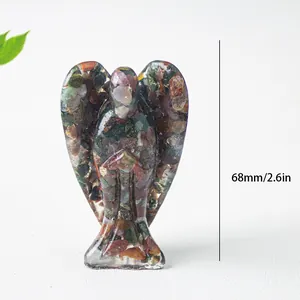 Detail showing a 68mm resin angel figurine filled with colorful natural crystals