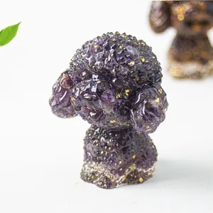 Macro view of purple amethyst crystal resin teddy dog figurine with gold foil