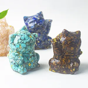 Fortune cat figurines crafted with natural crystal stones, resin, and gold foil accents