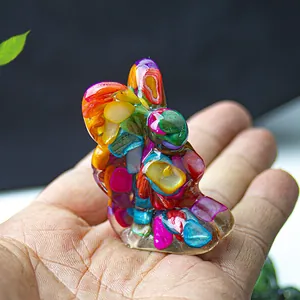 Macro shot of a bunny resin statue with colorful natural crushed crystal stone inlay