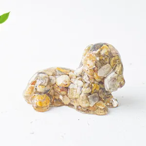 Macro view of a dog resin figurine filled with natural crystal stones for home decor