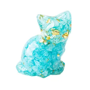 Cute sitting cat resin ornament with natural blue crystal stones and gold foil flakes