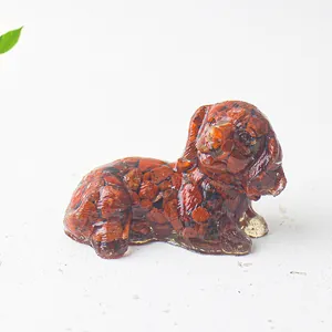 Detailed close-up of dog figurine made of red crystal gravel and transparent resin