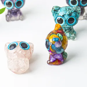 Handcrafted resin cat statues with natural crystals and expressive big blue eyes